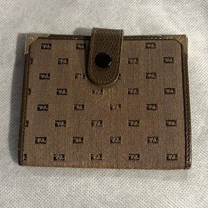 Used monogram fendi picture snap wallet
